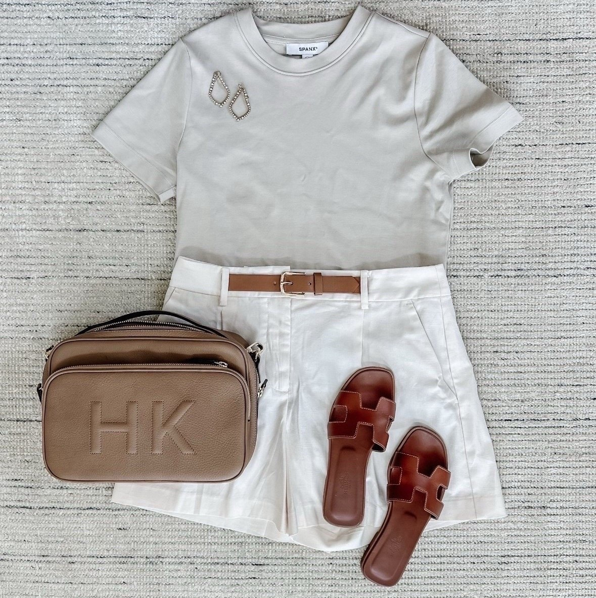 Summer outfit with casual everyday tee that is 15% off with code HKCUNGXSPANX styled with white shorts that are on sale for 50% off

#LTKStyleTip #LTKSaleAlert #LTKSummerEdit