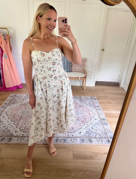 Love the silhouette and the pretty floral print of this dress 😍 I’m wearing a medium. Would also be a pretty wedding guest dress that’s not so formal! Date night outfit, summer outfit, summer wedding guest dress 

#LTKMidsize #LTKStyleTip #LTKWedding