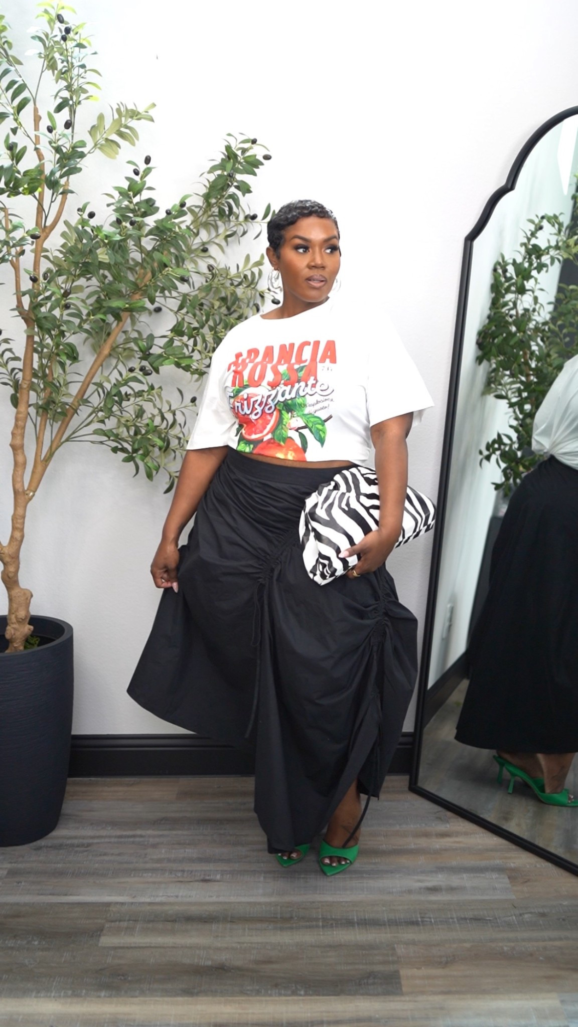 Fun way to style a graphic tee and skirt 

#LTKgrwm #LTKPlusSize #LTKootd