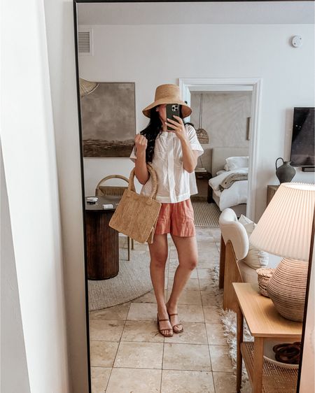 a classy, cute and breezy summer outfit ☀️ love these linen shorts, embroidered blouse, straw hat and bag! Can’t wait to try the bronzing drops too  

#LTKStyleTip