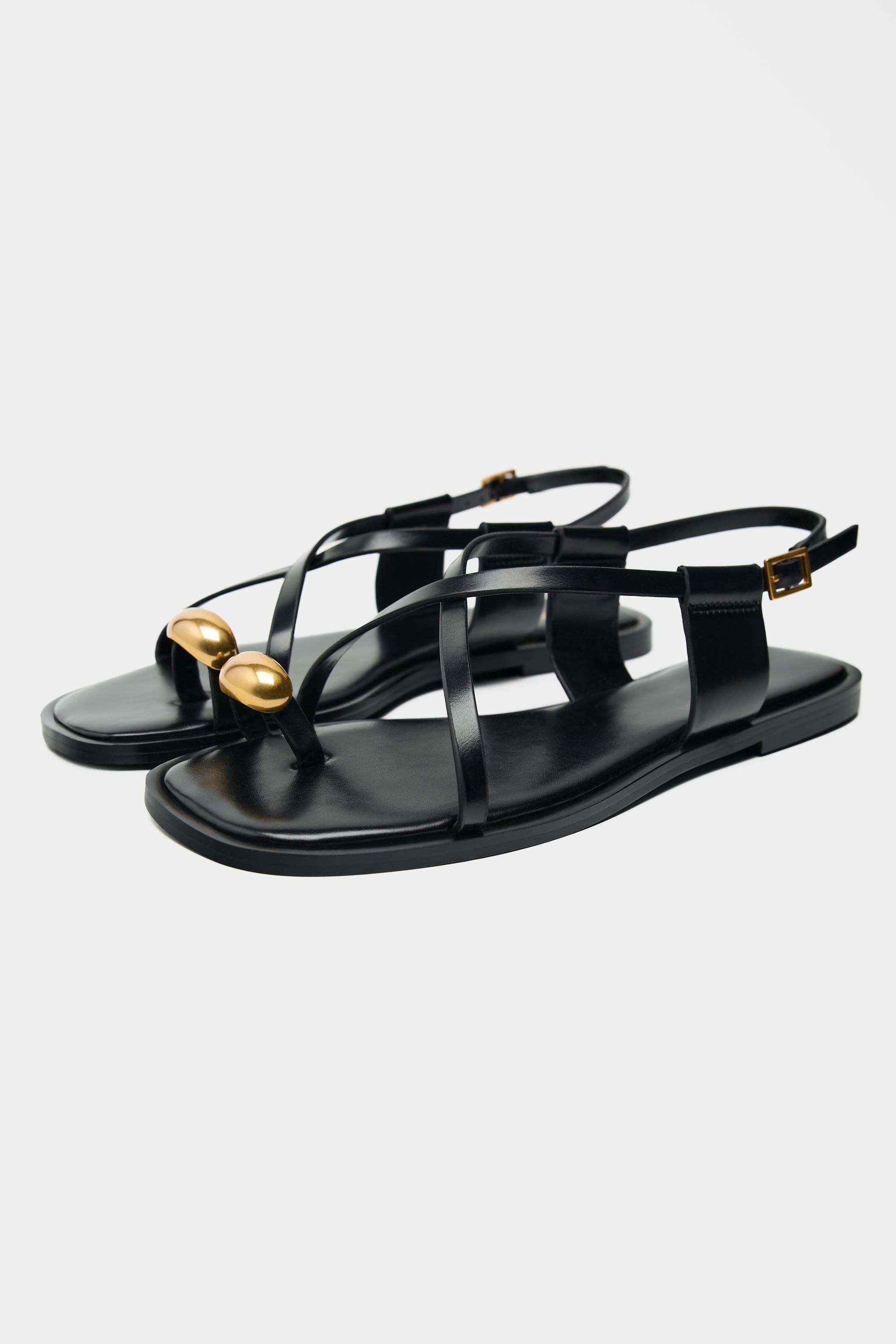 Flat sandals with thin straps and a metal ornament at the toe. Buckle closure. Sole height: 0.6 i... | Zara US
