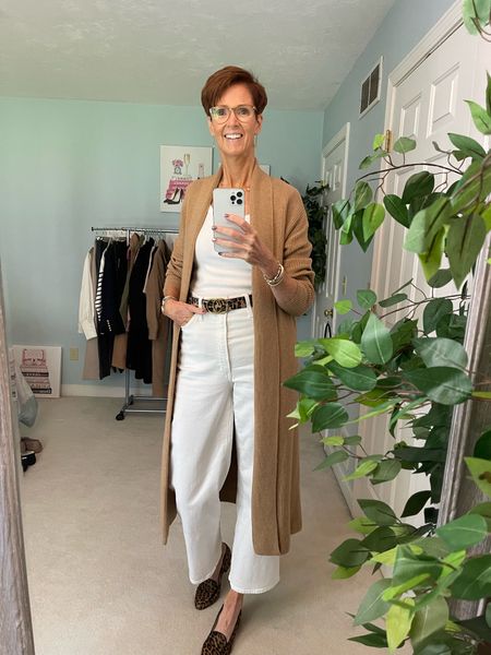 A great way to transition an all white outfit into the fall. Add some camel and leopard.
Wearing a white tee size medium from Anthropologie, white jeans size 30 tall from Madewell, a long camel duster cardigan from Banana Republic, and leopard shoes and belt.

#LTKfindsunder100 #LTKstyletip #LTKover40