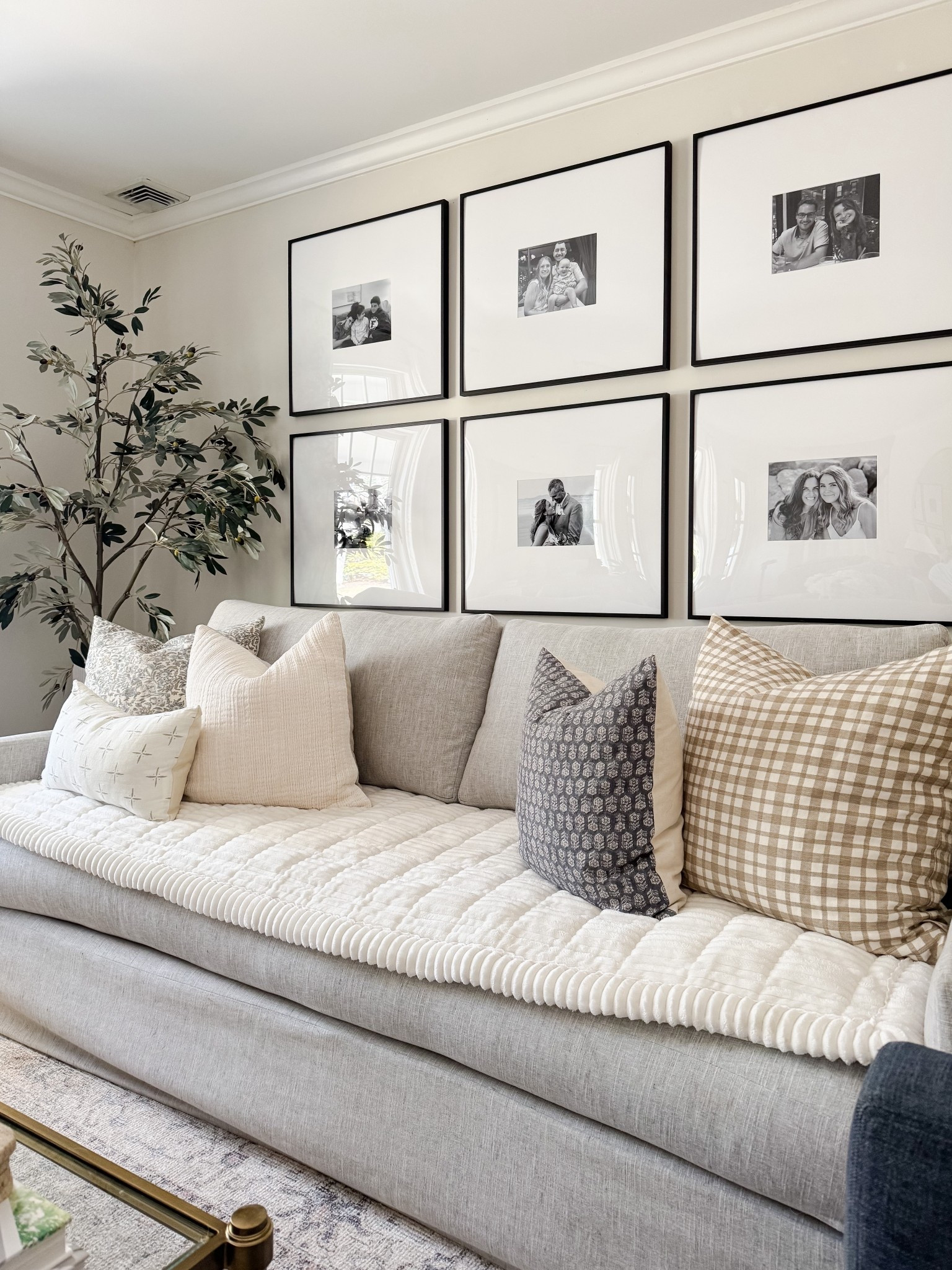 Living room decor ideas 🤍 Loving these finds for year-round display! Timeless, classic, and at various price points! Sofa cover, gallery frames, throw pillows, faux olive tree 

#LTKHome