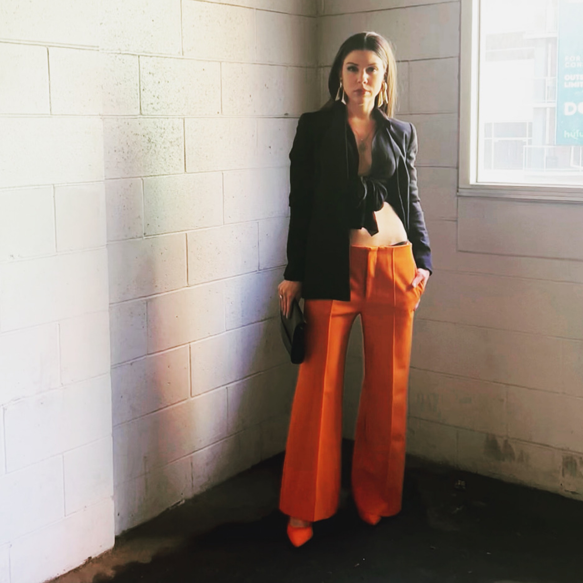 Wide leg orange pants • orange pointed toe pumps • black blazer • black crop tie front top • black envelope clutch • 

#LTKFind #LTKstyletip #LTKunder100