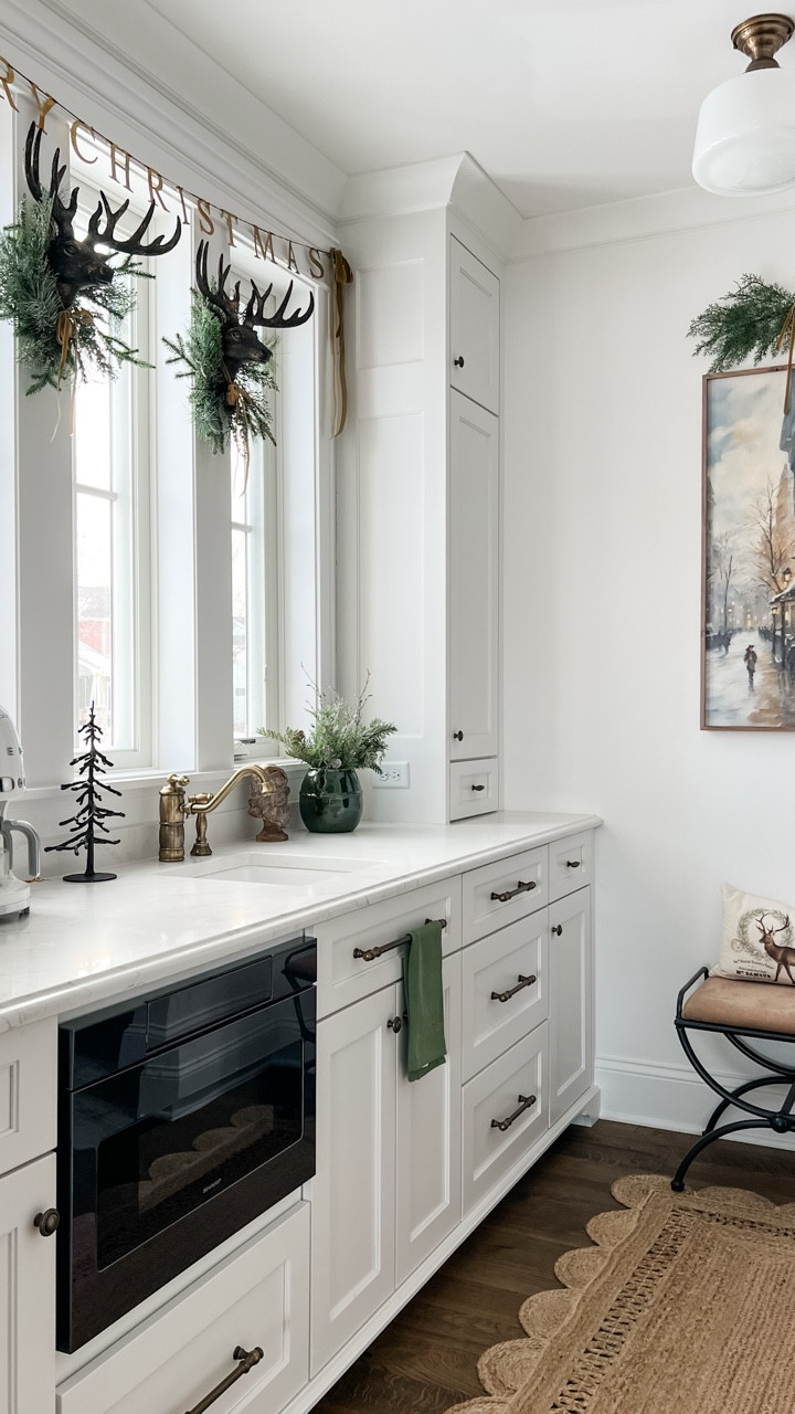 This $5 stem from Target works great to make a simple swag for above art or mirrors. Bend the stems downward a tad, wire together at middle and ends with floral wire and add velvet ribbon. I used a small command hook to hang.

For the stag wreaths, spray the white stags linked with brass paint. Add a bit of dark wax if you like. Tie a small bell around the neck with velvet ribbon. Hang a small wreath over the stag head  Hang with Velcro command strips. 

#targetstyle

#LTKHome #LTKFindsUnder50 #LTKHoliday