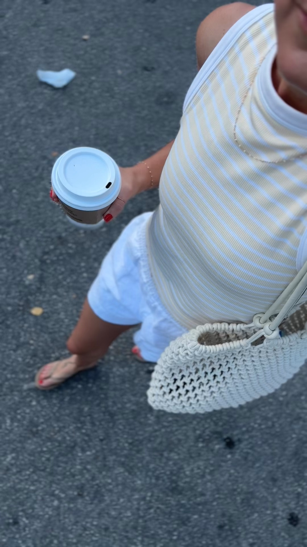 Wearing size small in tank and shorts 