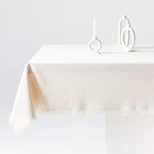 Craft Birch Beige Fringe Organic Cotton Tablecloth | Crate & Barrel | Crate & Barrel
