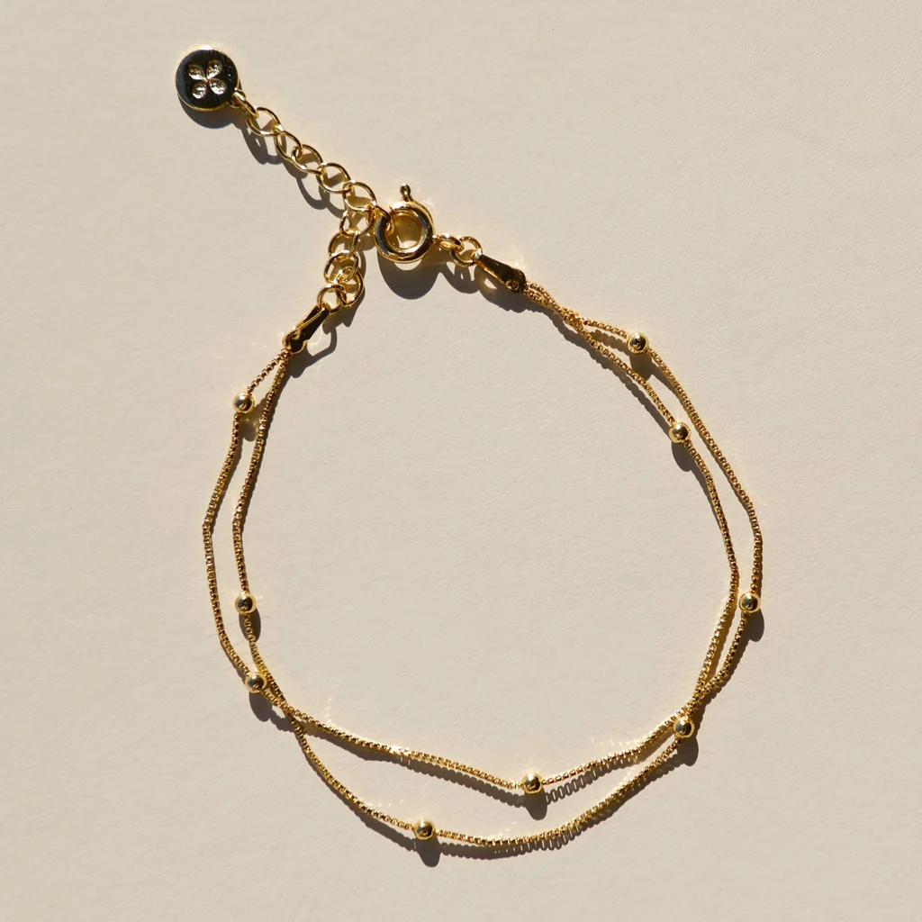 Gold Double Layer Saturn Chain Bracelet | Nickel and Suede