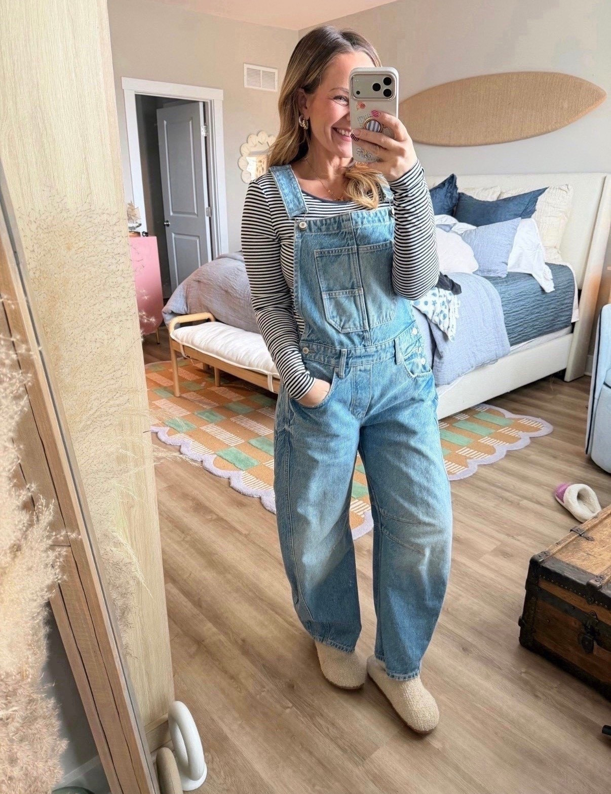 Okay this is peak effortless cool girl energy 👏🏼

Overalls are officially back and I’m not mad about it. These are the perfect relaxed fit — not too baggy, not too stiff — and they layer so well over a simple striped long sleeve. Easy, comfortable, and somehow still looks styled.

Wearing with cozy slippers here, but you could swap for sneakers or clogs and instantly change the vibe.

Fit notes:
• True to size
• Soft denim with structure
• Relaxed wide leg (so flattering)

Linking the overalls, striped tee, and slippers here 🤍 This is one of those outfits you’ll keep reaching for.