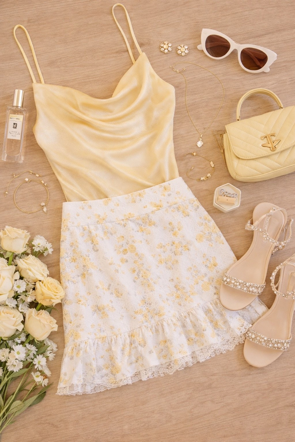 Soft yellow, delicate florals, and just enough sparkle to catch the light.

This is the kind of outfit that feels like spring the second you put it on — feminine, polished, and quietly statement-making.

Everything linked on my LTK ✨

#LTKootd #LTKSeasonal