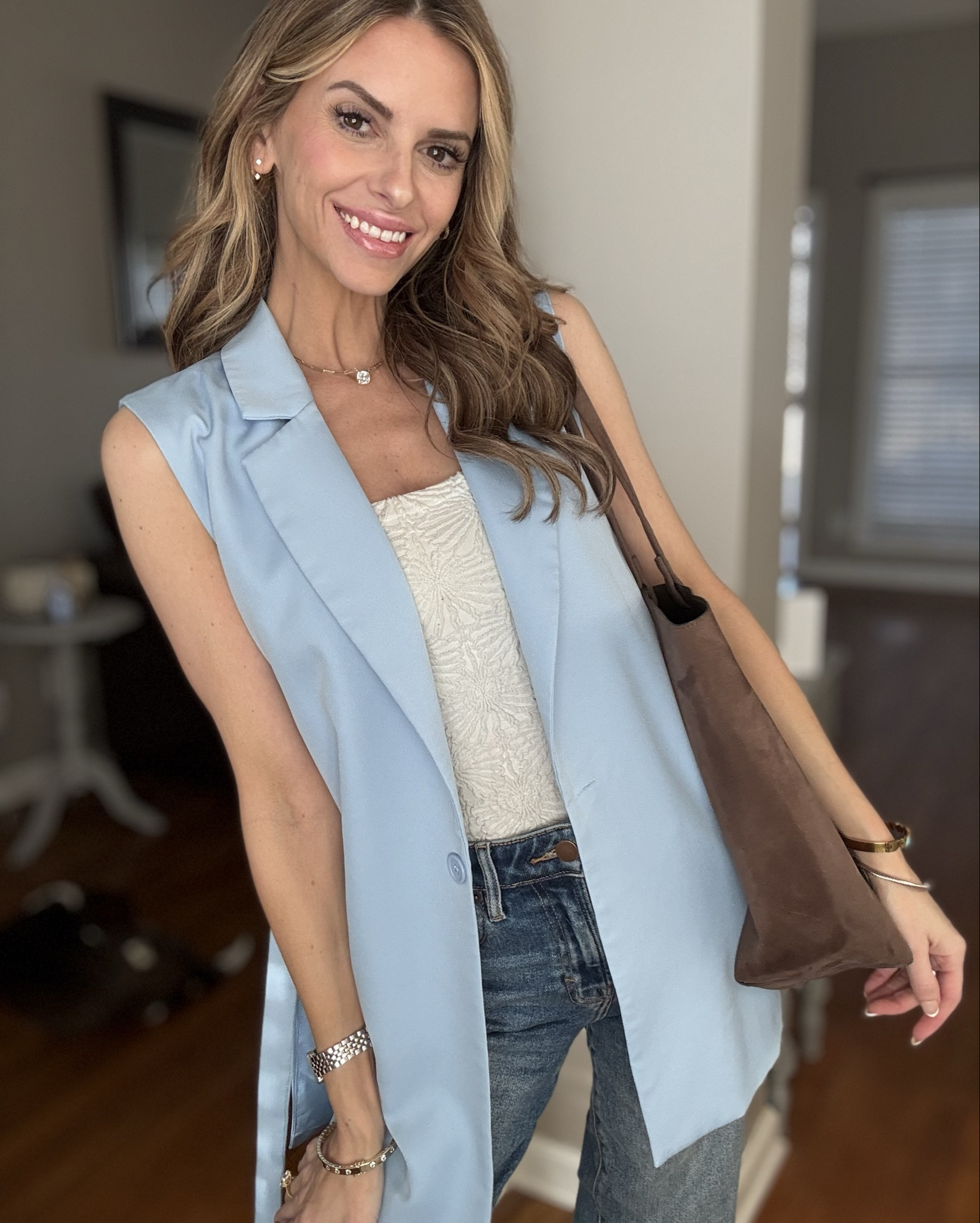 Cute open face vest with side ties and one button. Paired it with this wide tank top from altar’d state, jeans from vici, sandals from Walmart and bag from H&M, 

#LTKSeasonal #LTKFestival #LTKSpringSale