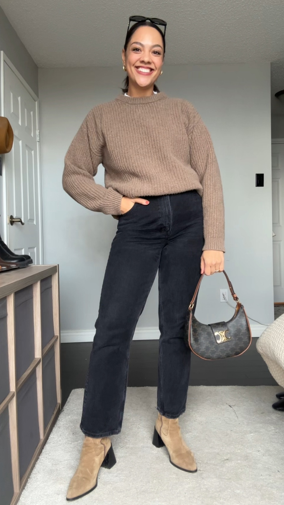 Ways to wear a crewneck sweater! Details below:

-Poppy Barley crewneck sweater in the colour dune. Made with 100% superfine lambswool. Super soft and versatile! I’m wearing a large. 
-Abercrombie 90s straight jeans in black. I have the curve love style in a size 29 long. 
—Suede tan ankle boots. Similar linked. 
-Celine Triomphe Ava bag in canvas  
-Celine Triomphe 52mm sunglasses in black acetate. 

#LTKfindsunder100 #LTKSeasonal #LTKstyletip