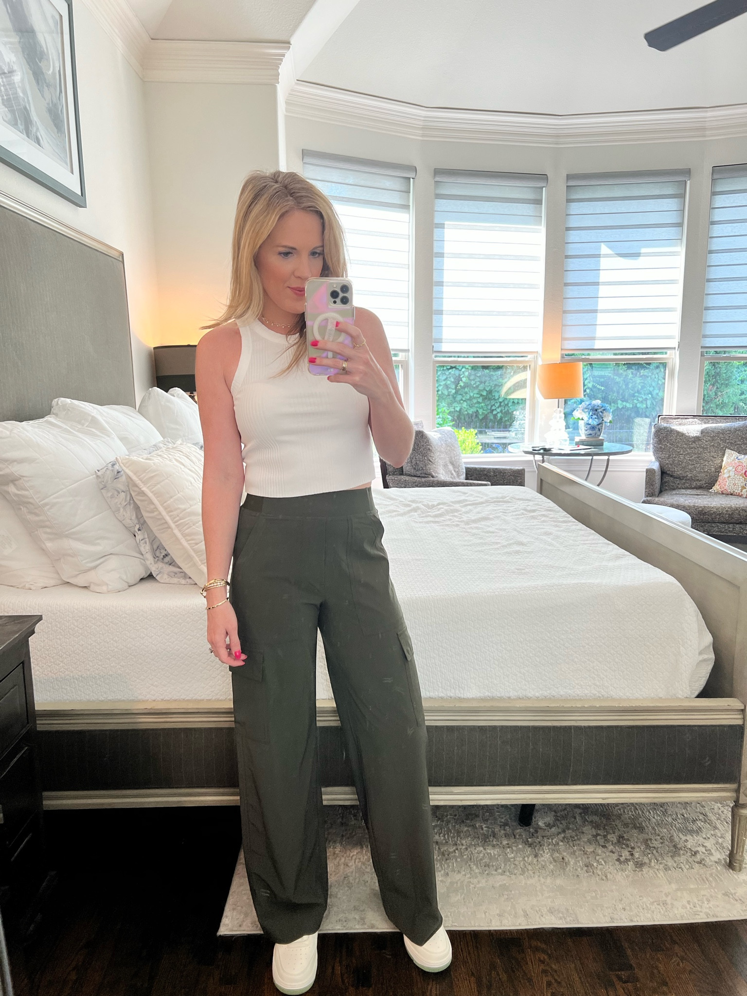 Athleta look
Casual summer look 
Brooklyn wide leg cargo pants 
Cropped white tank 
Aerie tank 
White Nike sneaker 
White Nike Air Force one 
Travel look 
Casual style 

#LTKTravel #LTKFindsUnder50 #LTKSeasonal