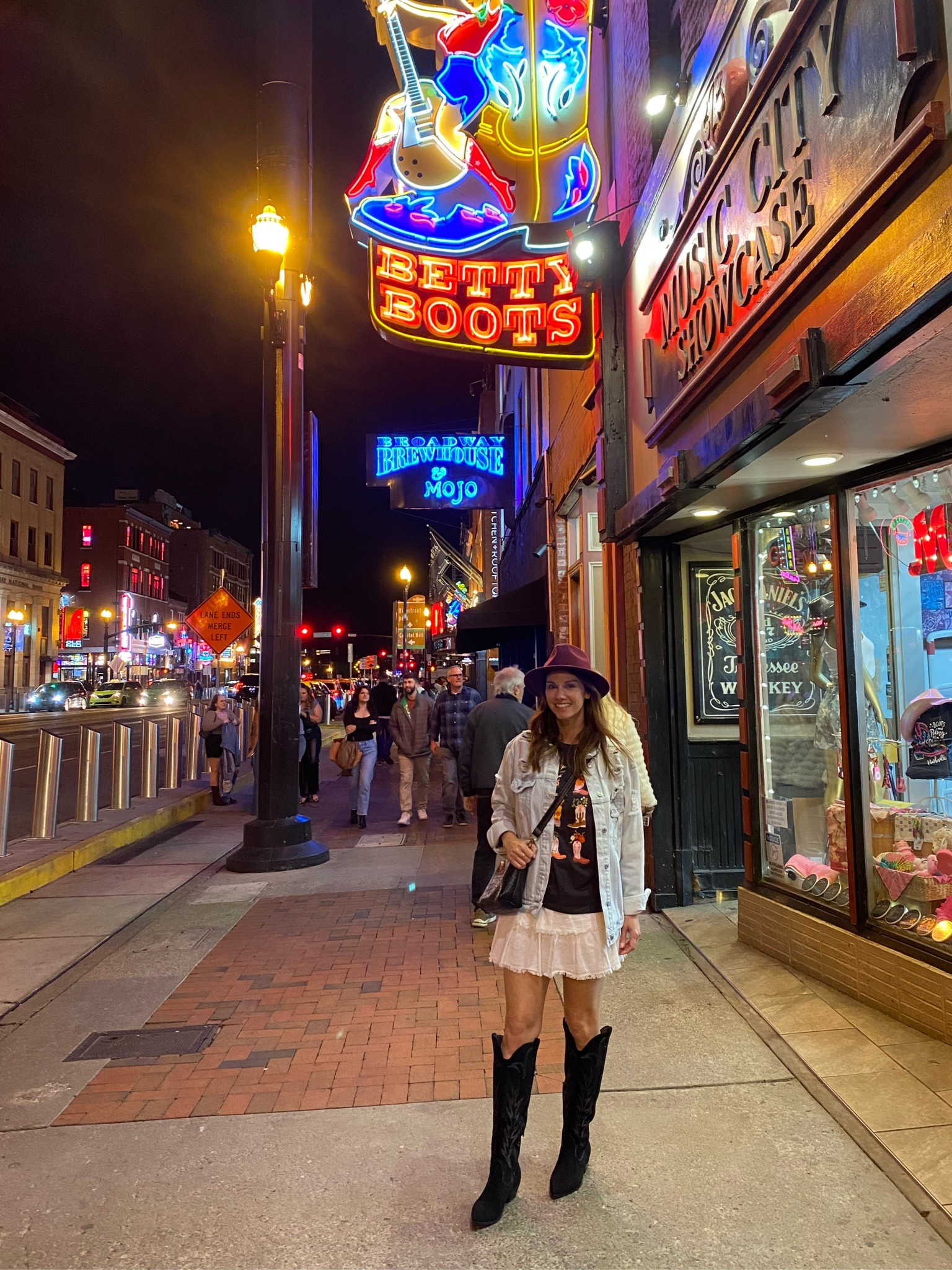 Nashville outfit. Linking my cowgirl boots graphic tee below and linked other similar items as these exact boots and skirt are sold out. 

#LTKOver40 #LTKStyleTip #LTKFindsUnder100
