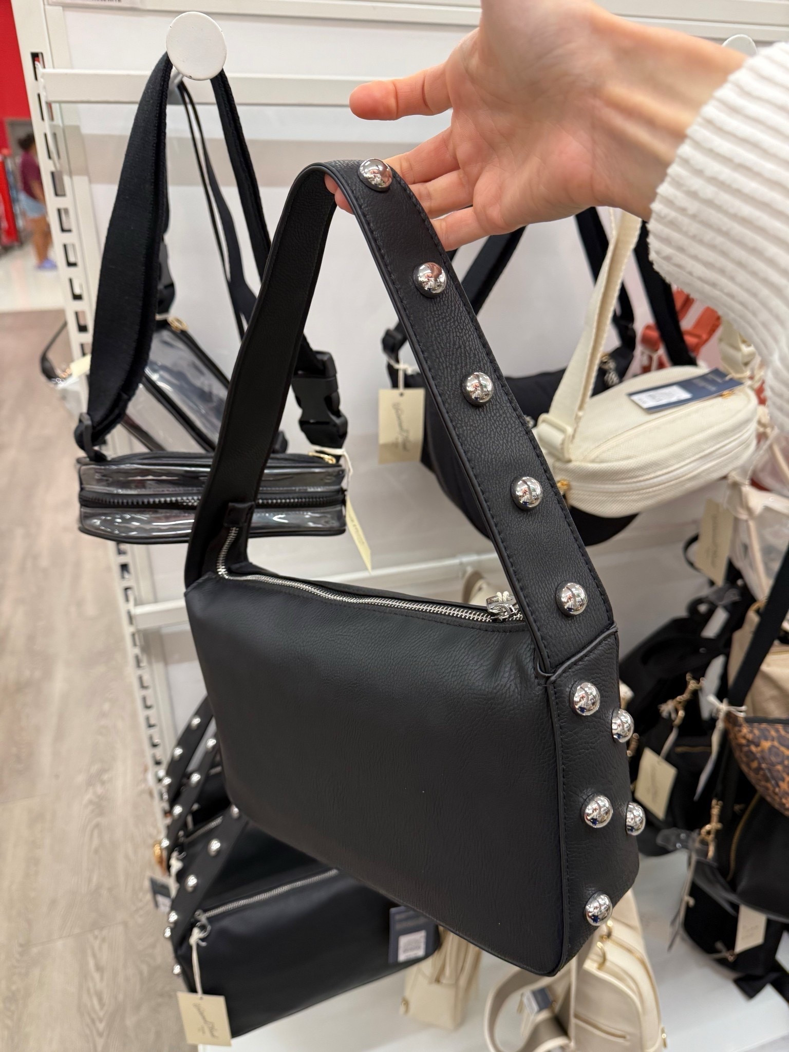 Studs add extra flair to an otherwise basic item. This target studded black shoulder bag is the perfect dupe for Madewell. Madewell is also having an awesome extra 40% sale on the real leather bags I linked / ordered! There are some gorgeous suede options as well. Perfect for fall outings, work, travel, etc, and perfect gifts to yourself, best friend, mother in law, any gal! 

#LTKSaleAlert #LTKGiftGuide #LTKStyleTip