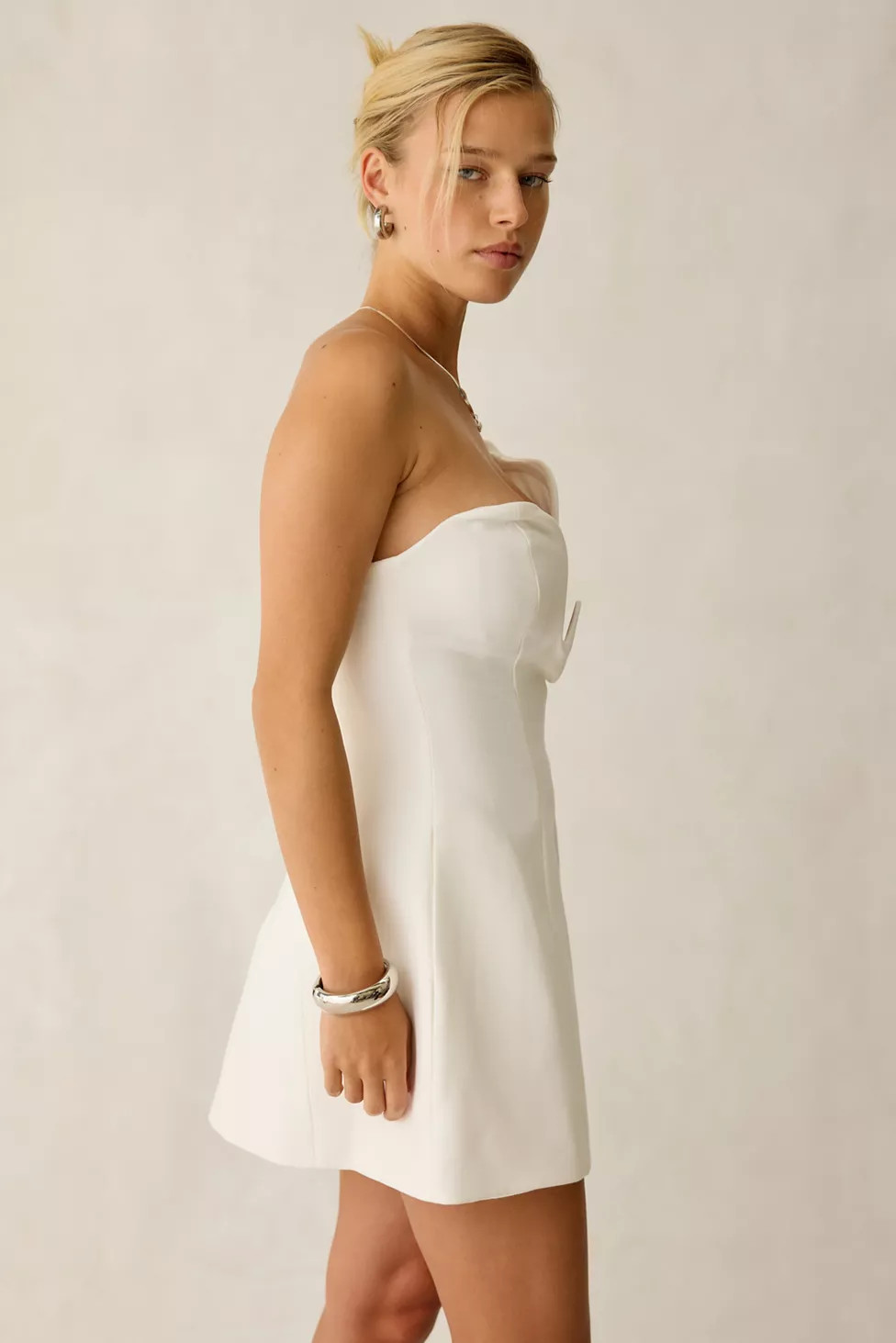 Bardot Rosalyn Sculpted Asymmetric Hourglass Strapless Mini Dress | Urban Outfitters (US and RoW)
