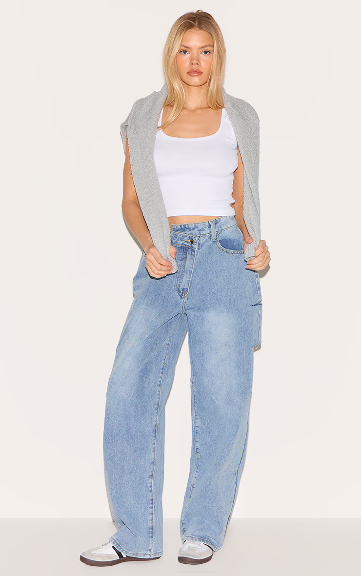Light Blue Wash Asymmetric Waistband Baggy Low Rise Thigh Split Boyfriend Jeans | Denim | PrettyLittleThing US