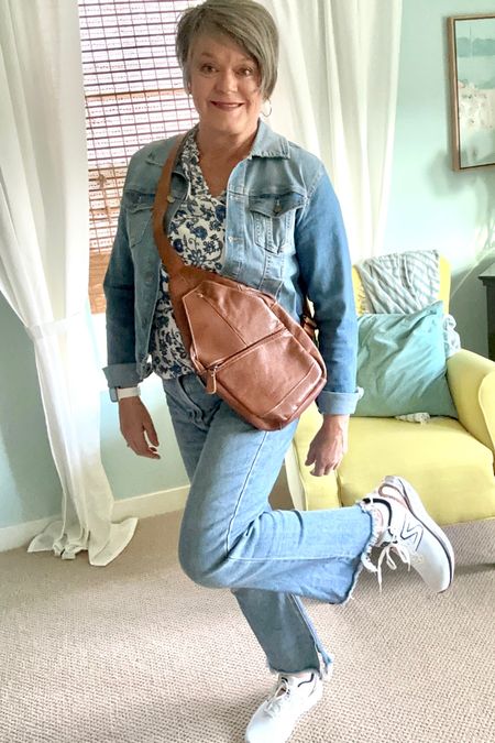 Denim on denim! Right now these are my top favorite is frayed hem cropped flaredjeans. Wearing this style is perfect for fall because you can wear the with all kinds of different shoes and boots and it changes the look. Topped with denim jacket and white sneakers. All you need is a leather #crossbody bag. Classic look! #denimondenim #denimjacket #whitesneakers 

#LTKstyletip #LTKshoecrush