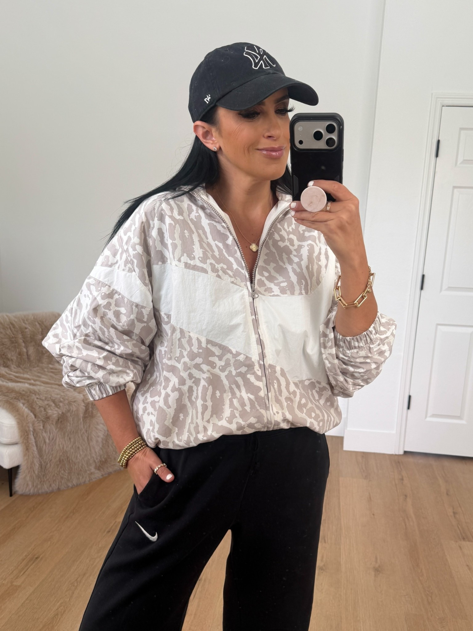 Sportswear Trend Woven Heritage All Over Print Jacket wearing size small.  Sportswear Phoenix High Waist Wide Leg Sweatpants wearing size medium. 