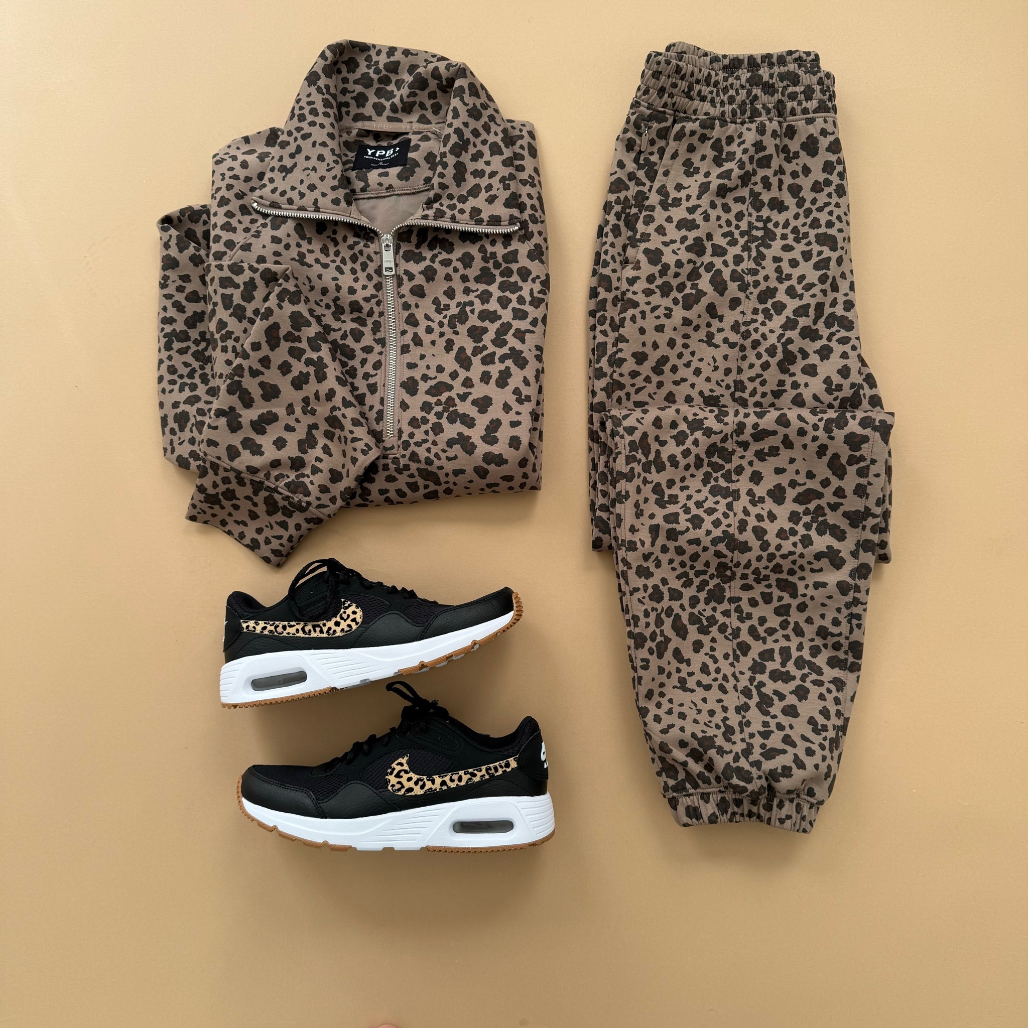 YPB neoKNIT Polo Sweatshirt. YPB neoKNIT Sweatpant. Nike Air Max SC
