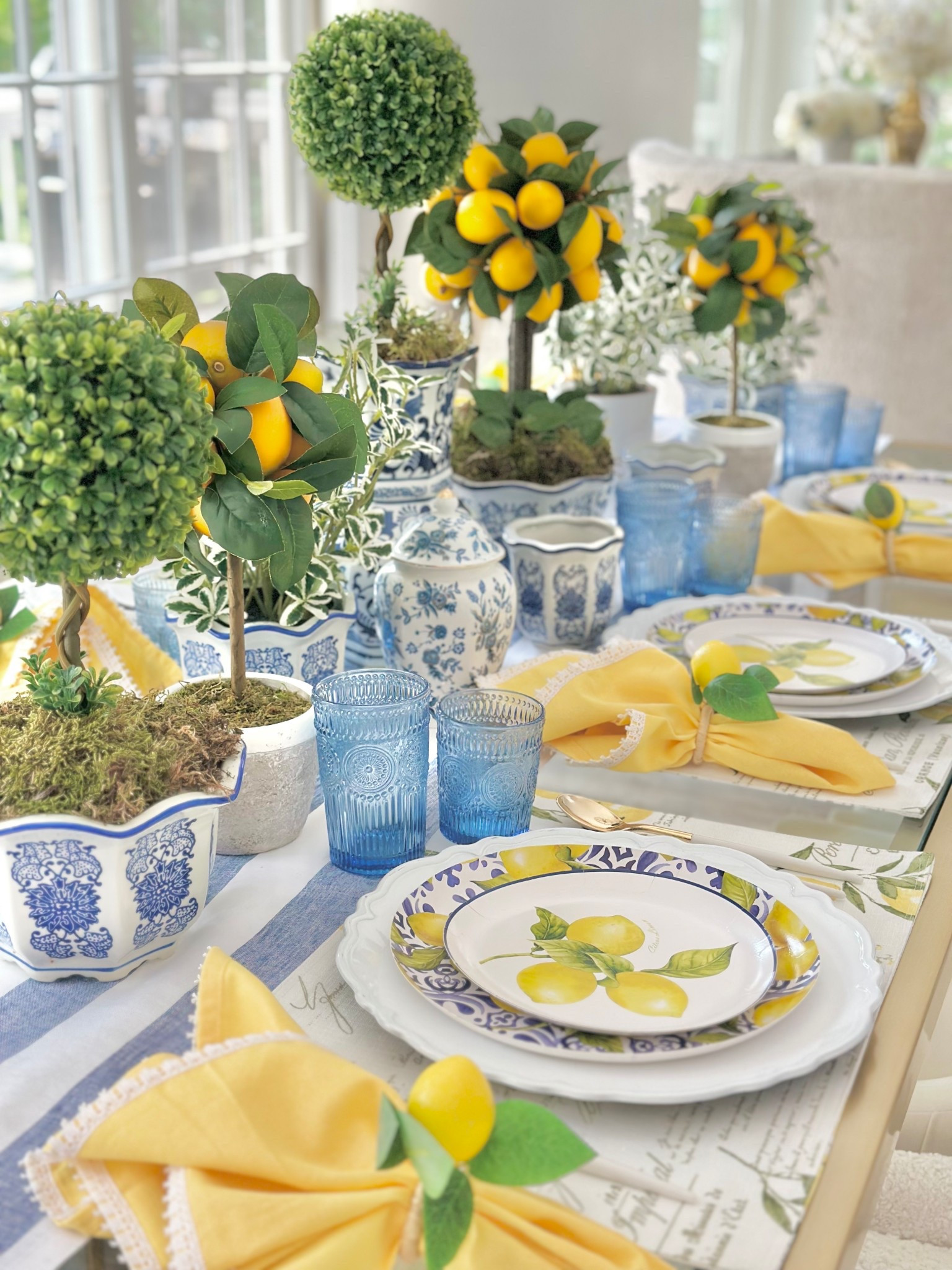 Re-create my tablescape for a touch of a Mediterranean flare for your guests to enjoy! Would you believe those plates are paper? So budget friendly and easy cleanup too!

#LTKHome #LTKSeasonal