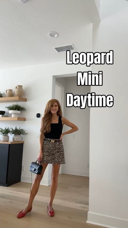 I this Leopard denim mini skirt- daytime with a tank and red ballet flats, night with black leather jacket & red slingbacks ❤️❤️ It's such a fun piece! The leather jacket is oversized and so comfy. Wearing xs & my normal denim size in the skirt. I cut the skirt 2 inches!! 

#LTKfindsunder100 #LTKSeasonal #LTKshoecrush