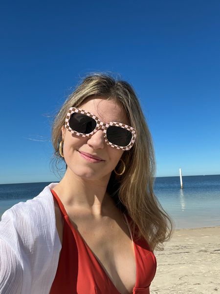 Vacay vibes. Sunglasses only $12 at target (when you click the link to the blue glasses it actually takes you to the check board pair). 
Swim suit from Amazon wearing size small  

#LTKtravel #LTKFind #LTKSeasonal