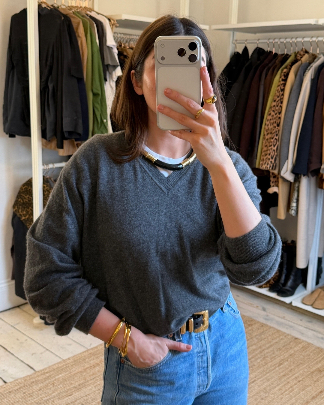 Styling a grey v neck with a pop of a white t-shirt, vintage cuff necklace and blue denimm

#LTKwinter #LTKstyletip