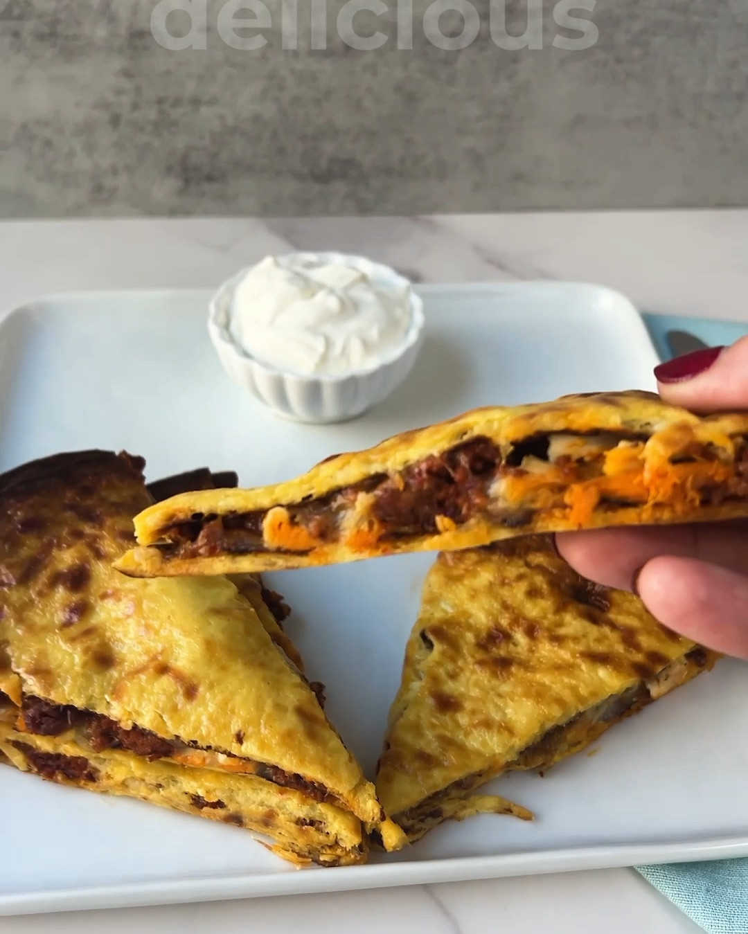 Holy smokes did this recipe turn out great! Make this AMAZING Carnivore quesadilla for yourself:

Carnivore flatbread:
1 cup shredded whole milk mozzarella cheese (skim will not work)
1 cup high fat greek yogurt
3 eggs

1. Preheat oven to 425 degrees F. 
2. Mix ingredients.
3. Line a baking pan with parchment paper or a silicone baking mat and pour the mixture onto it. 
4. Bake for 20 minutes.

Carnivore Quesadilla
1 Carnivore Flatbread
1 cup shredded whole milk mozzarella
1/2 cup cooked chorizo
1/2 cup shredded rotisserie chicken

1. Preheat oven to 350 degrees F.
2. Flip Carnivore flatbread over on the baking sheet and layer the cheese, chicken, and chorizo on one half. Flip the other half of the quesadilla onto itself.
3. Bake for 10-13 minutes or until the cheese is melty. Cut and enjoy!


 #carnivore #carnivorelifestyle #animalbased #meat #carnivorewoman
#keto #lchf #weightloss #carnivorerecipes 

#LTKHome #LTKHoliday #LTKVideo