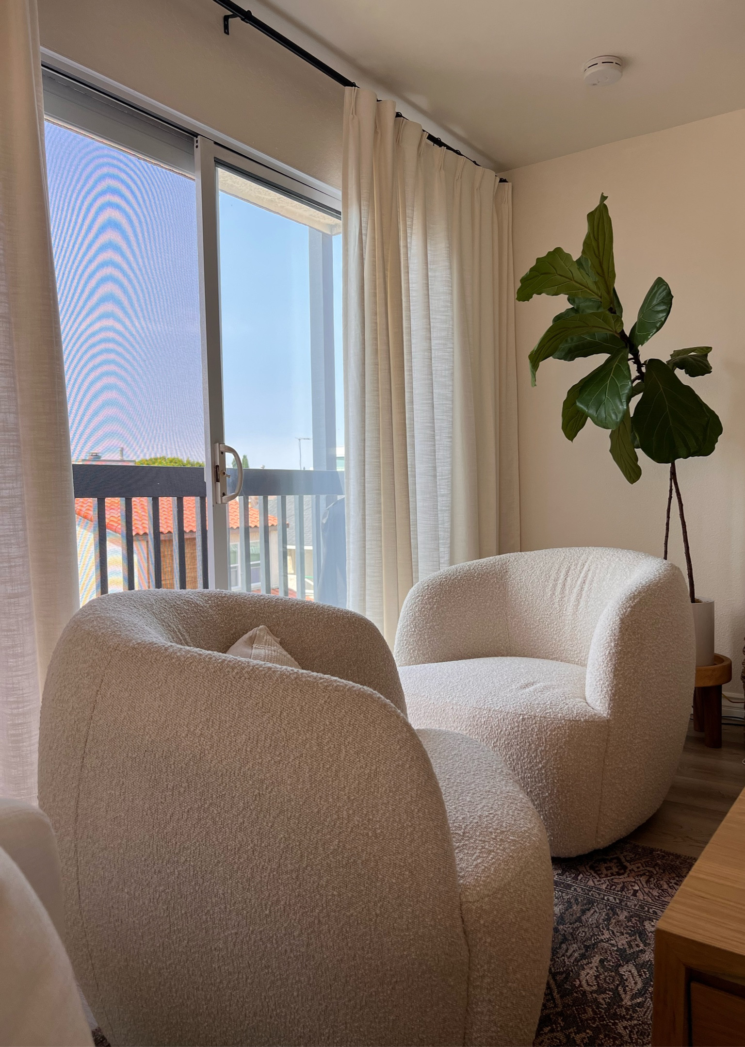 My favorite part of my home. Boucle Swivel chairs and the most gorgeous, pleated curtains.

My curtains!! I loveee them! I'm also linking the rod & hardware that I used to put them up!
Liz Polyester Linen Drape Pleated Color: ivory white
Lining Type: Room Darkening, Shading Rate 70%-85%, 117 gsm cotton white
Memory shaped

#LTKstyletip #LTKhome #LTKfindsunder50