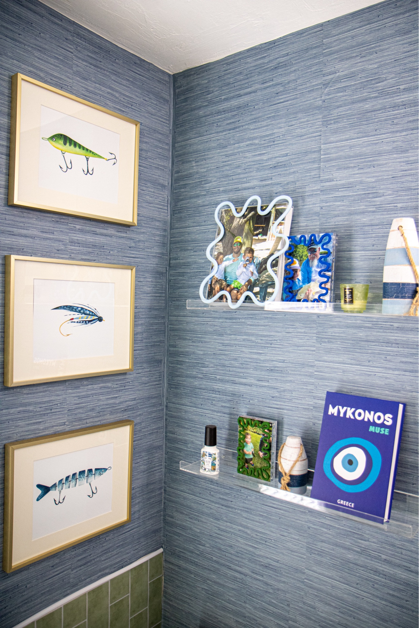 The boys bathroom update is finally complete. 💚💙 A weekend project that turned into MONTHS of hunting for the perfect shower curtain.. I did not think that would be the hardest part of this project! 🫠 Lucky for you I sourced this custom shower curtain from @pepperhome & it arrived DAYS after I ordered it! The rest of the project just took me a weekend - paint on the cabinet, peel & stick @socialsociety wallpaper, a new light & mirror! 

Boys bathroom, nautical bathroom, blue and white, green and blue home decor, grass cloth wallpaper, scalloped mirror, scalloped picture frame, #pepperhome #SLpartner #serenaandlily #socialsociety 

#LTKkids #LTKhome #LTKfamily