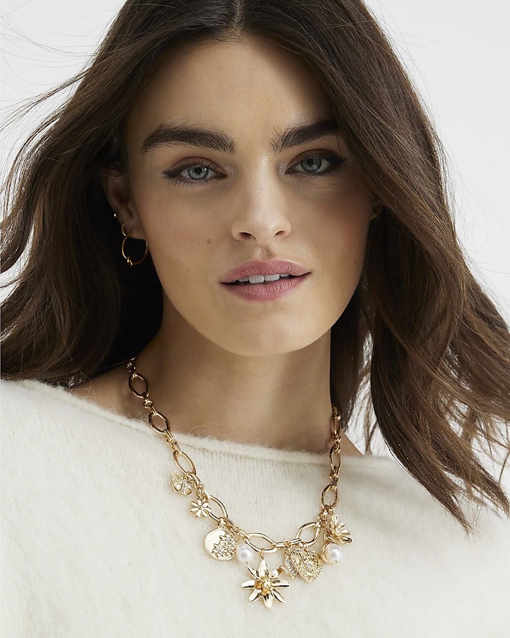 Gold Floral Charm Necklace | River Island UK & IE