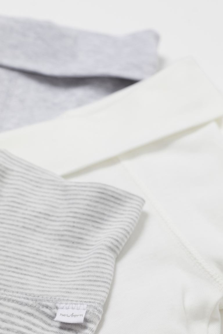 Conscious 
	Pants in soft cotton jersey. Wide foldover ribbing at waist and covered feet with ela... | H&M (US + CA)