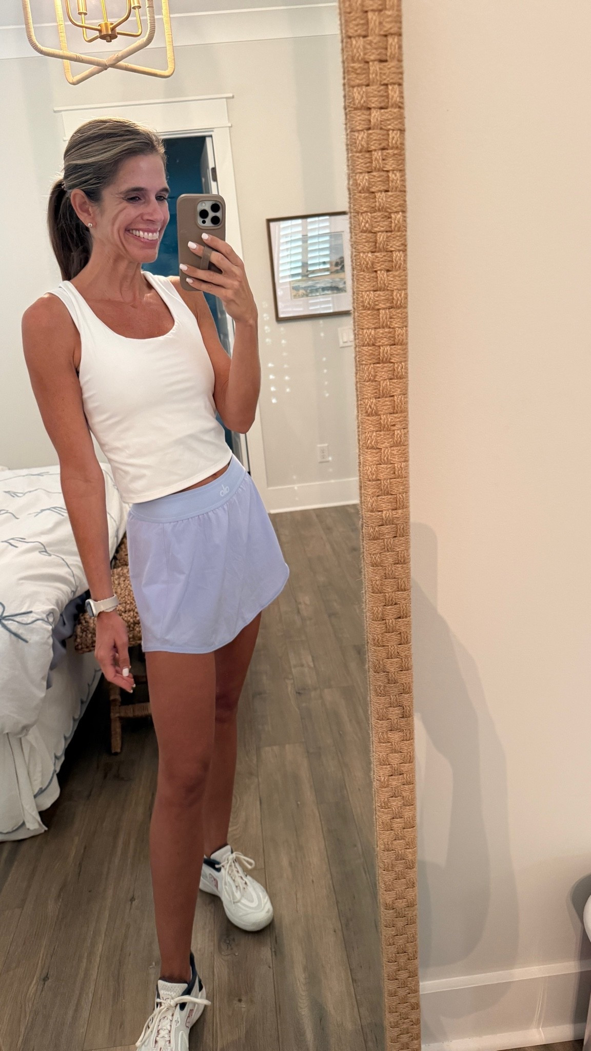 Alo Tennis skirt, Amazon bra tank
Both pieces are so comfortable and stay in place while playing.

#LTKActive #LTKootd #LTKOver40