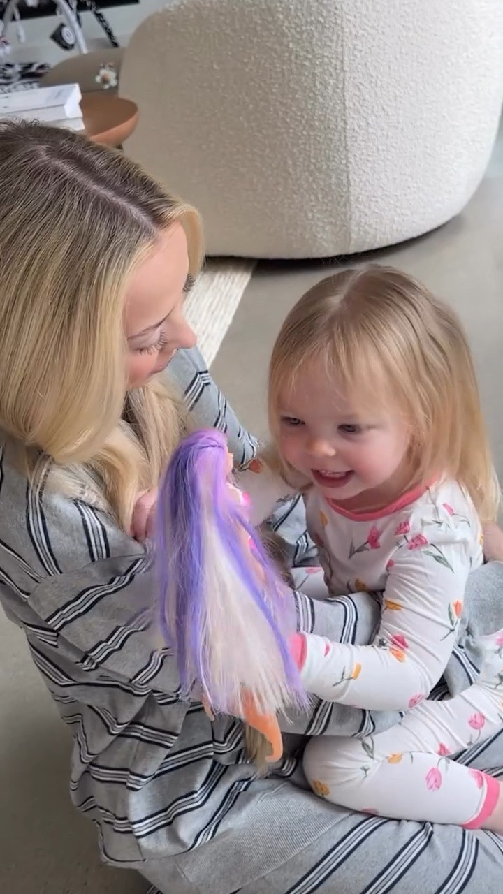 When Ellie started putting makeup ALL OVER her face! 😅🙈 backstory ::: Kay had a work trip to LA for a podcast, and just got back. When we got home Ellie was already asleep, so the next morning I got Ellie up and when Kay came down after getting ready, I captured them seeing each other again! 💜 Ellie was so happy to see Kay and even said that she missed her! 🥹 Ellie immediately wanted to show Kay that she got a package because lately her favorite thing to do with Kay is open up our PR packages! 😂 So She guided Kay to it to see what was inside. It was some bathing suits and some “momma makeup” and Ellie really wanted to wear some. She put it on her face and it was so cute! Ellie was so excited to be wearing some momma makeup and being with Kay again! 🥹

#LTKKids #LTKmomlife #LTKootd