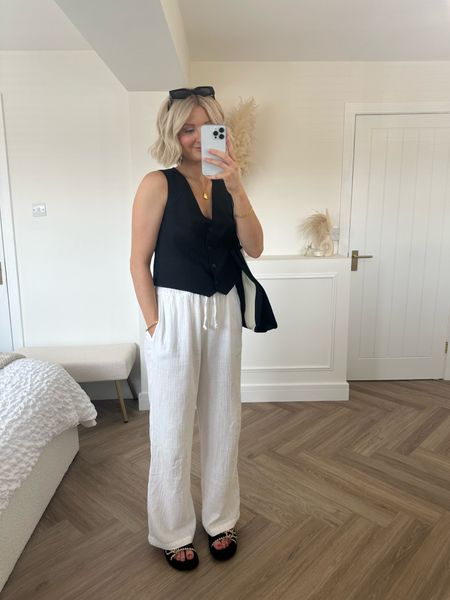 Linen trousers and black waistcoat outfit for a minimal, comfy but chic summer vibe 💫

#LTKstyletip #LTKfindsunder50 #LTKeurope