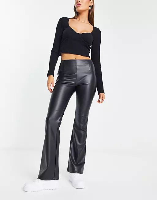 ASOS DESIGN stretch faux leather flare trouser in black | ASOS (Global)