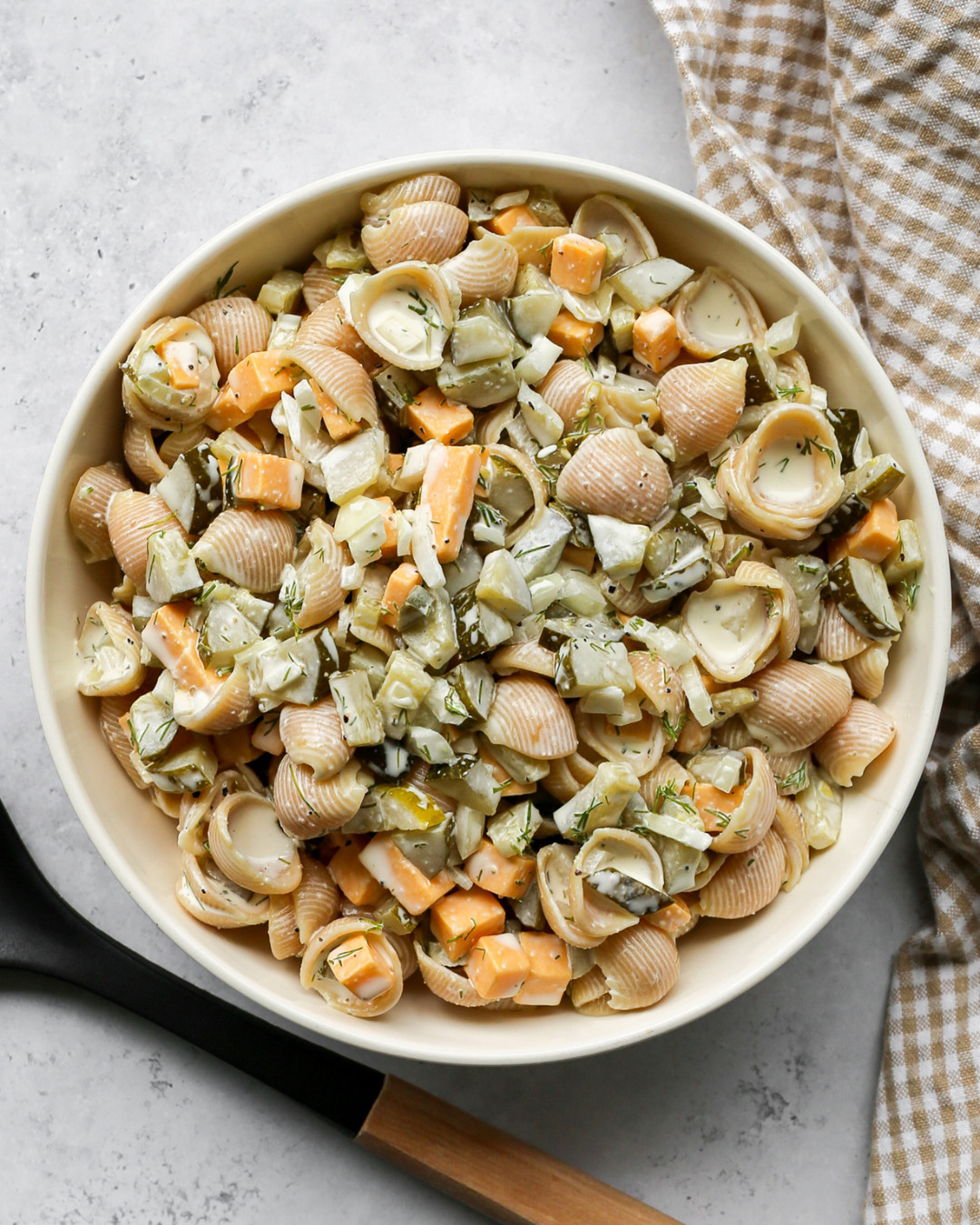 Everything you need to make this Gluten Free High Protein Dill Pickle Pasta Salad is right here. The Cuisinart 6 quart pasta pot with the straining cover makes cooking and draining the pasta so easy with no separate colander needed. The OXO wooden utensil set is what I reach for when stirring everything together, the measuring spoons make sure the dressing seasoning is perfectly balanced, and the cutting board set is perfect for chopping the pickles, onion, and cheddar cheese cubes. Tap to shop everything I used to make this recipe! 

 #LTKdayinmylife #LTKfoodie #LTKHome