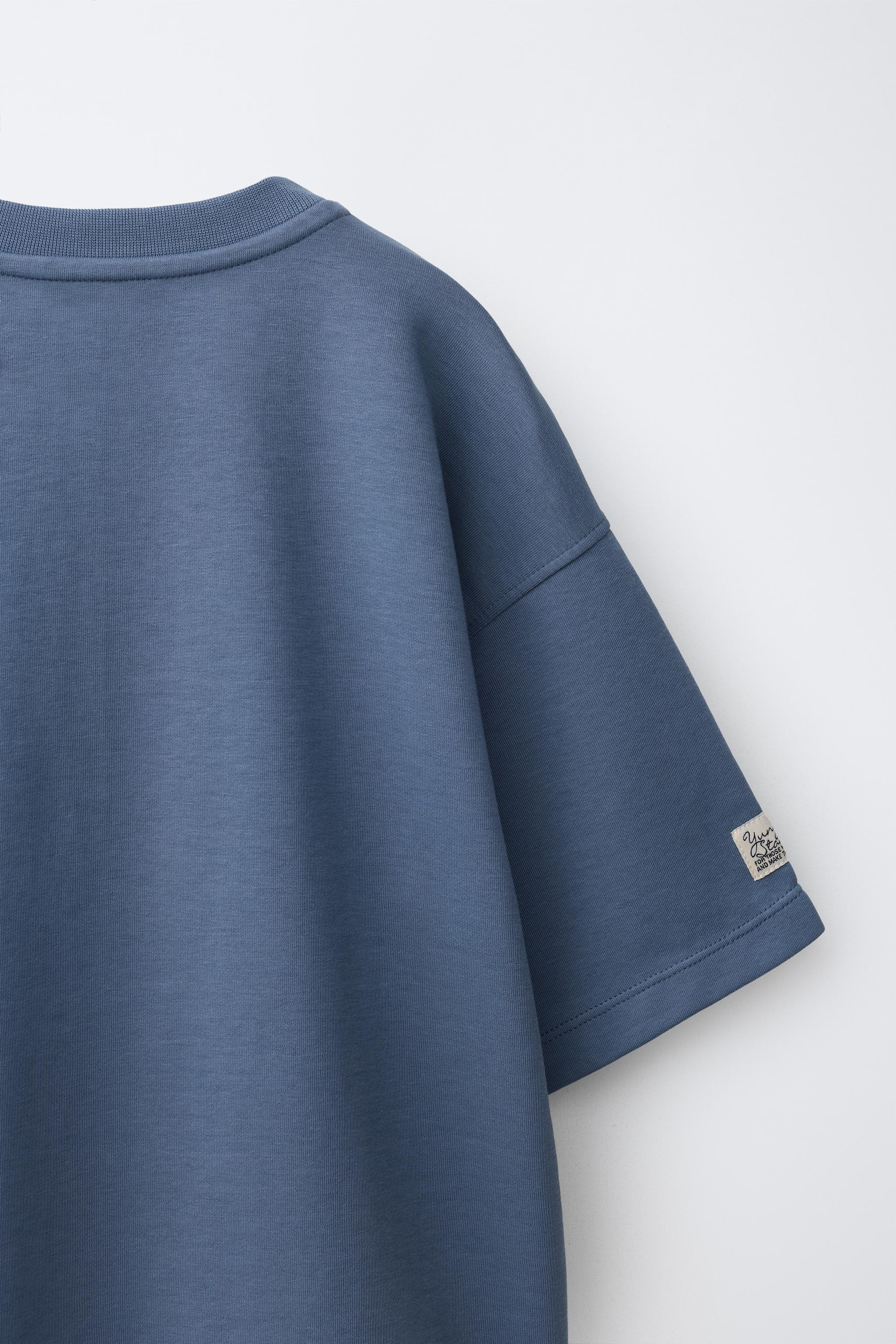 Crew-neck short-sleeve T-shirt. Features embroidered text detailing on the chest and an appliqu\u... | Zara US