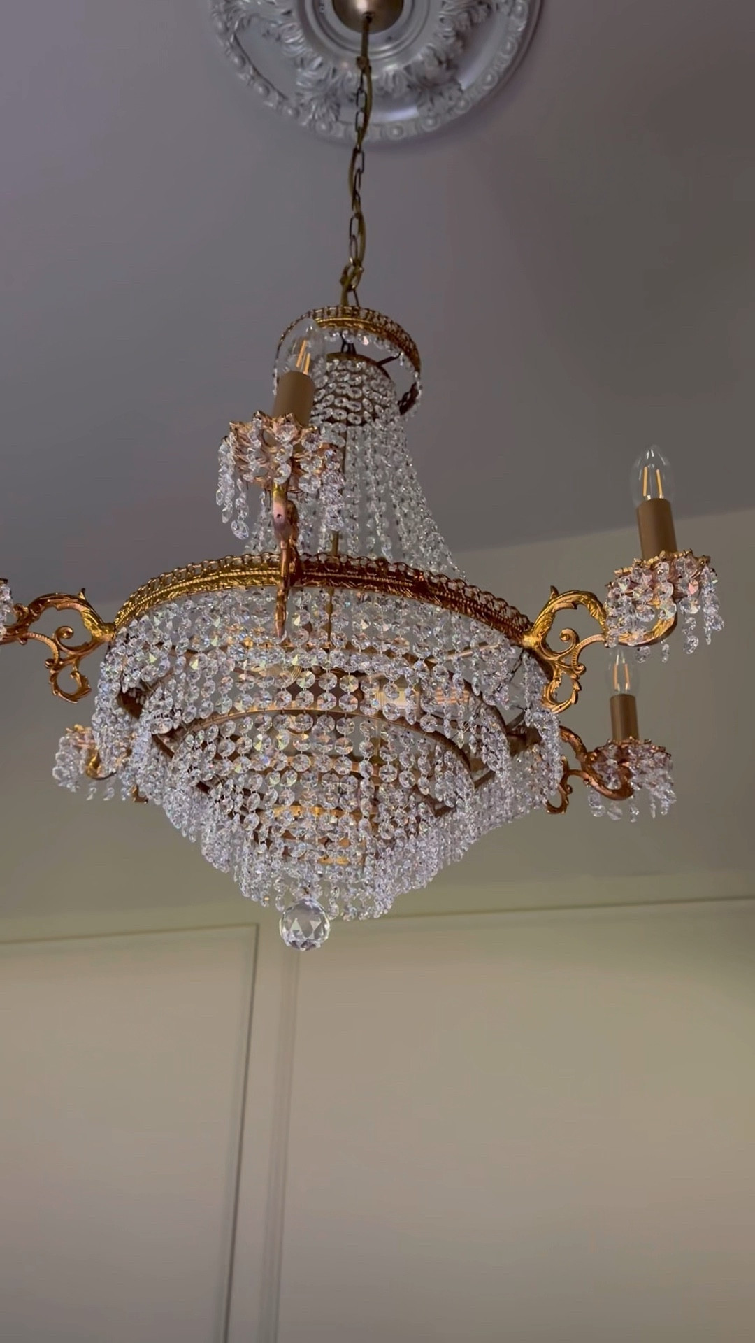 Light fixtures are like artwork to me, so when I found this antique French empire chandelier decked out with crystals I knew it would be perfect against the dark backdrop in the primary bedroom. Don’t forget the medallion the next time you’re updating your fixtures! Linking some similar chandeliers here! ✨

#LTKVideo #LTKStyleTip #LTKHome