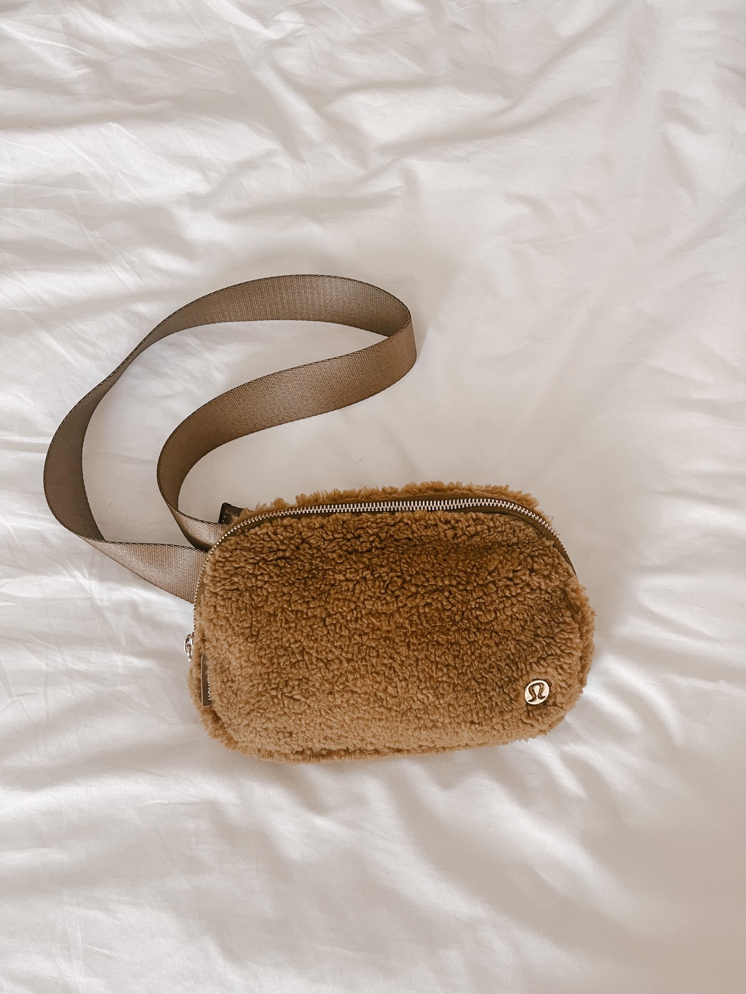 lululemon fleece (sherpa like) everywhere belt bag in burnt caramel! 

#LTKitbag #LTKunder100 #LTKSeasonal