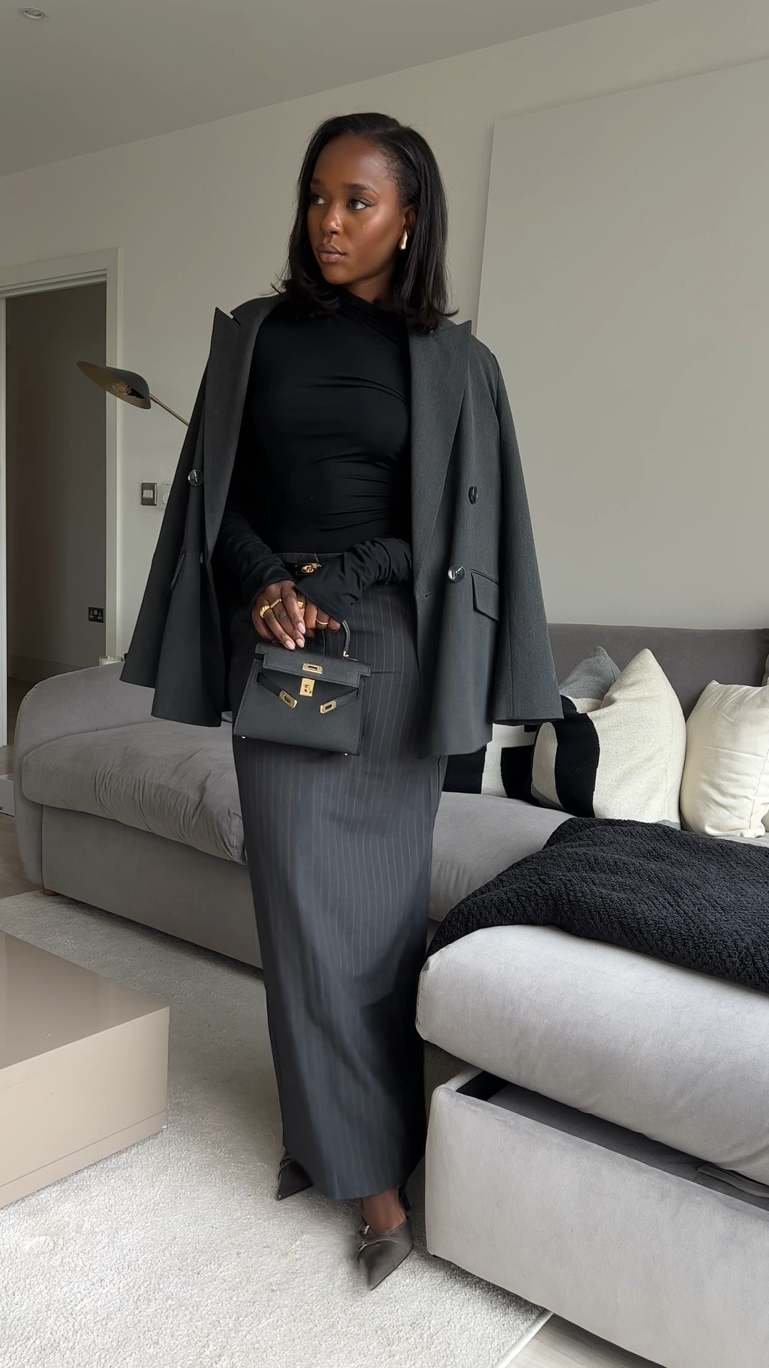 Pinstripe midi skirt & grey blazer

#LTKSeasonal #LTKstyletip #LTKeurope