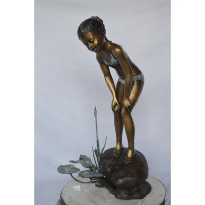 Copper and Metal Girl looking at frog jumping bronze fountain - Size: 21"L x 15"W x 38"H. | Wayfair North America