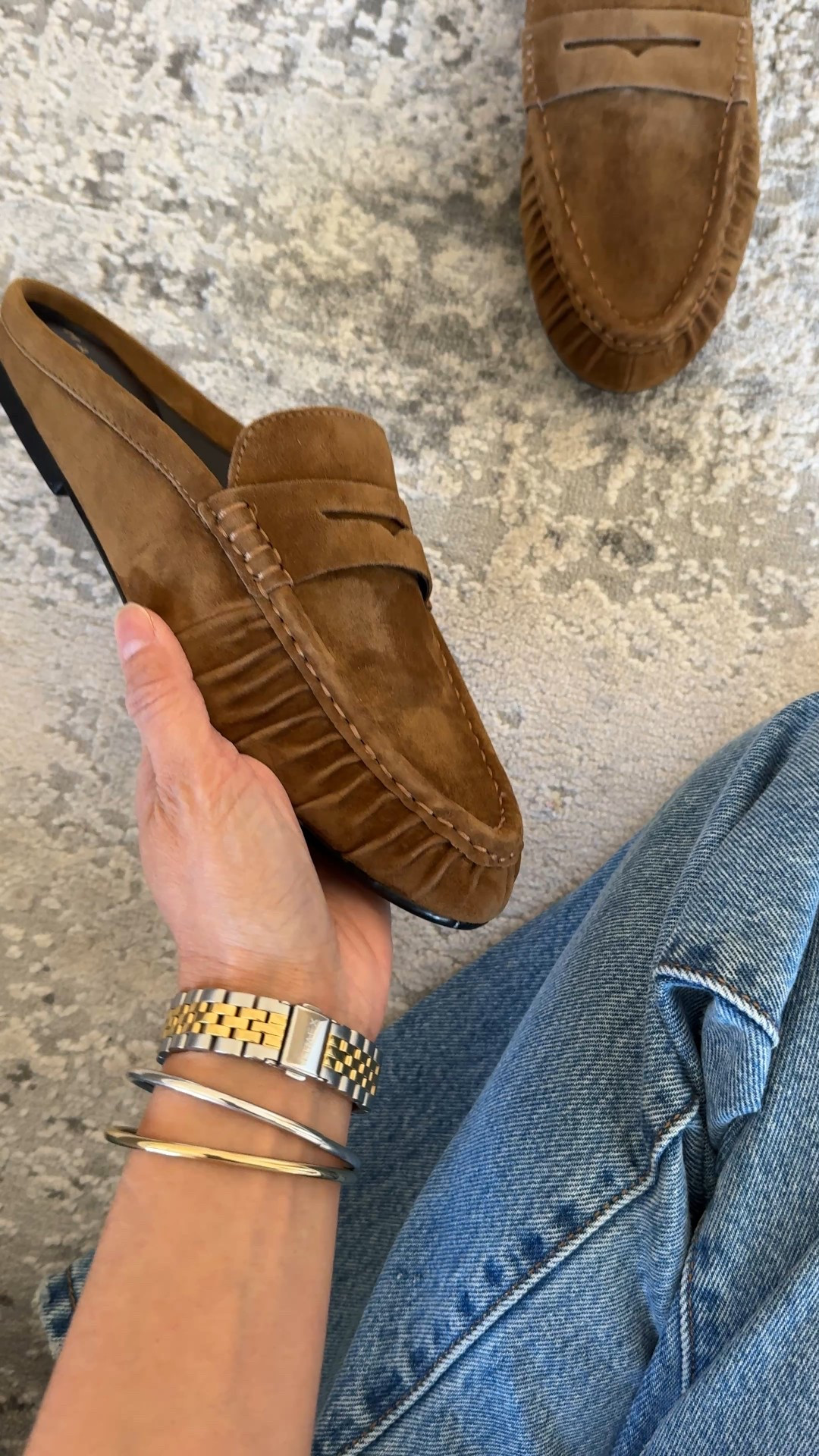 Casual chic loafer mules. Modern classic style. I’ve been wanting add a pair of loafers to my wardrobe for a while now, but couldn’t seem to find the right ones for me. Searching for more casual to wear mostly with jeans. I’m still looking to try a full loafer style, but these mules drew me in. I love ruched leather look. 
- Sizing seems true to size. I usually take a 6 in flats and that’s what I have here. If you intend to wear thicker socks, you could size up. 
- Comfy out of the box and seems to be good quality to last beyond a season. 
- These jeans are a good staple classic straight leg that also comes in ankle length. True 100% cotton denim that gets better with time. I size up in this style. 
- Classic cable knit sweater in an oversized fit. 
- Favorite staple white t-shirt as a base layer. 
- Convertible leather bag. Mid-priced luxury bag  


#LTKootd #LTKOver40 #LTKWorkwear