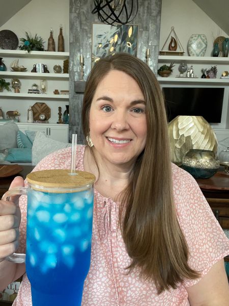 Making a pretty blue flavored water using a Starburst Blue Raspberry packet and a Sonic Ocean Water packet. Linking my glass tumbler, which is the largest clear tumbler I’ve found. 

#LTKunder50 #LTKcurves #LTKFind
