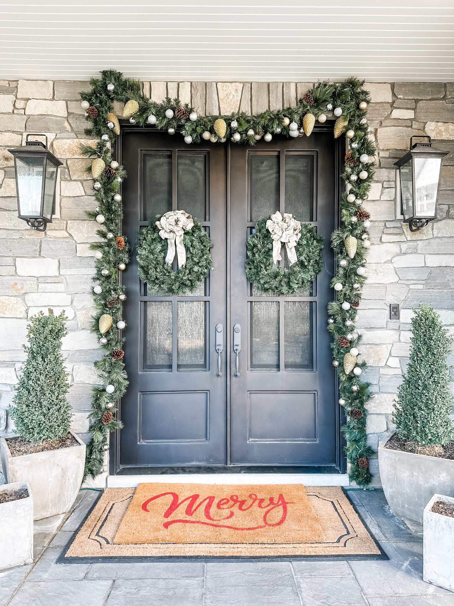 Easy front door & porch holiday decorating with a festive rug, wreaths, & garlands.🎄

#LTKSeasonal #LTKHoliday #LTKhome