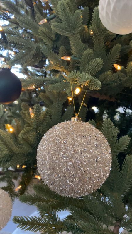 My favorite, super inexpensive, tinsel ornaments are back in stock for the moment! They sell out quick every year so I recommend grabbing these as soon as possible! I have the champagne and white color on this Christmas tree!

#ChristmasOrnaments #ChristmasOrnament #ChristmasDecor #ChristmasTree #Ornament #HolidayDecor #NeutralChristmas #NeutralChristmasDecor #Target #TargetHome 

#LTKhome #LTKHoliday #LTKfindsunder50