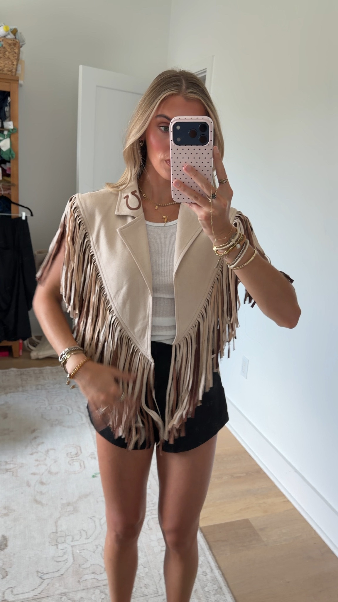 @thewillowtree Effortless layering meets Western charm with this cream and tan two-tone shrug. The relaxed shrug collar frames your face beautifully, while the open front design lets you style it over any outfit. Horseshoe detailing adds authentic cowgirl flair, and playful tassel accents complete the look.

#LTKootd #LTKSeasonal #LTKdayinmylife