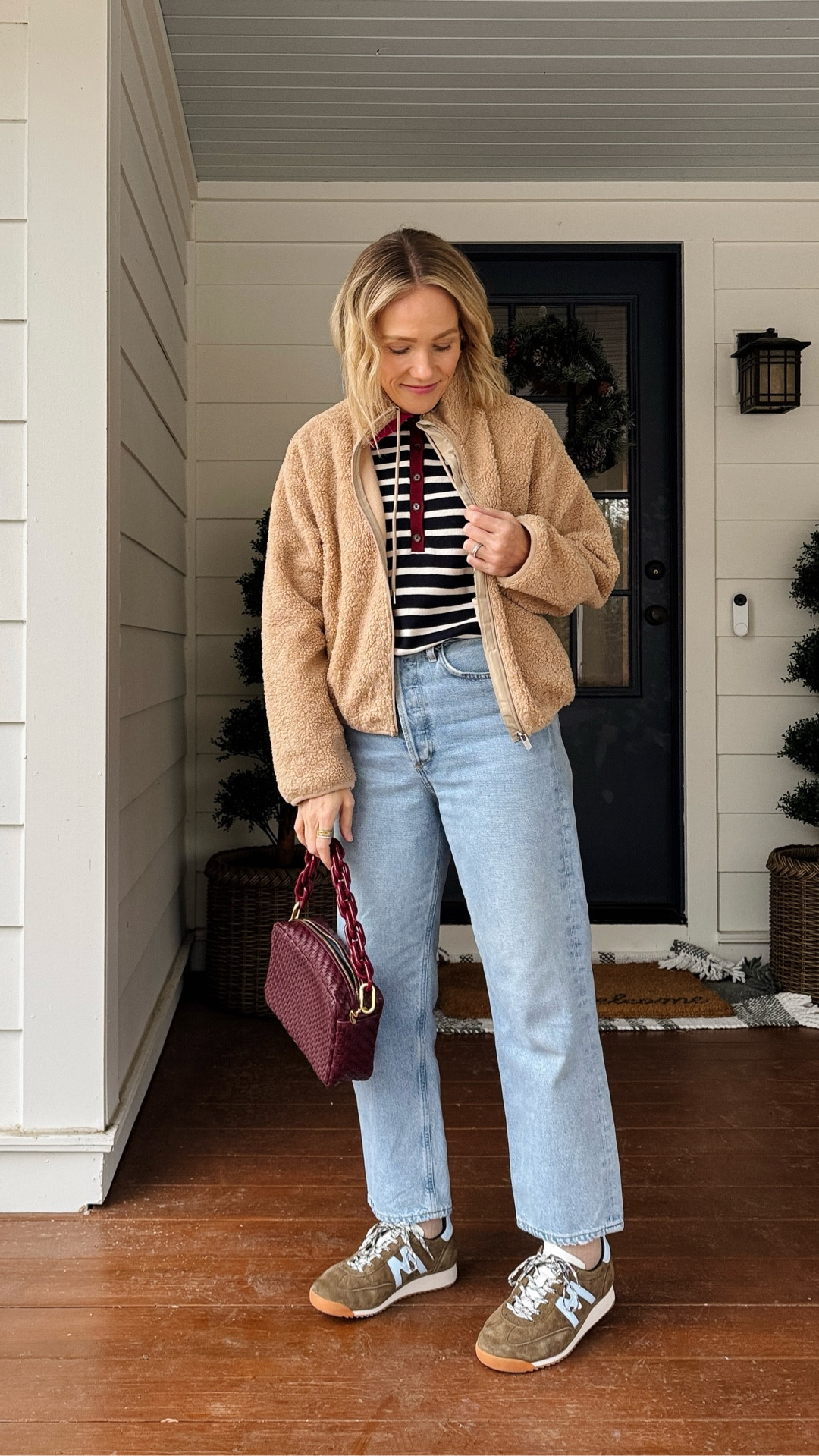 Boden stripe top & Athleta cozy jacket wearing my regular size small ~ Agolde 90's crop jeans I own in 3 washes they're so good (wearing Force today, own Hooked & Essence) wear my regular size, crop length (5'3") ~ Anthropologie x Karhu collab sneakers true to size & currently on sale ~ Clare V Marisol crossbody worn with Shortie strap, also the green midi sac for slightly smaller style ~ EBY underwear size up to medium ~ merit flush balm on cheeks & lups in color LeBonBon ~ xo, Claire

#LTKgrwm #LTKOver40 #LTKootd