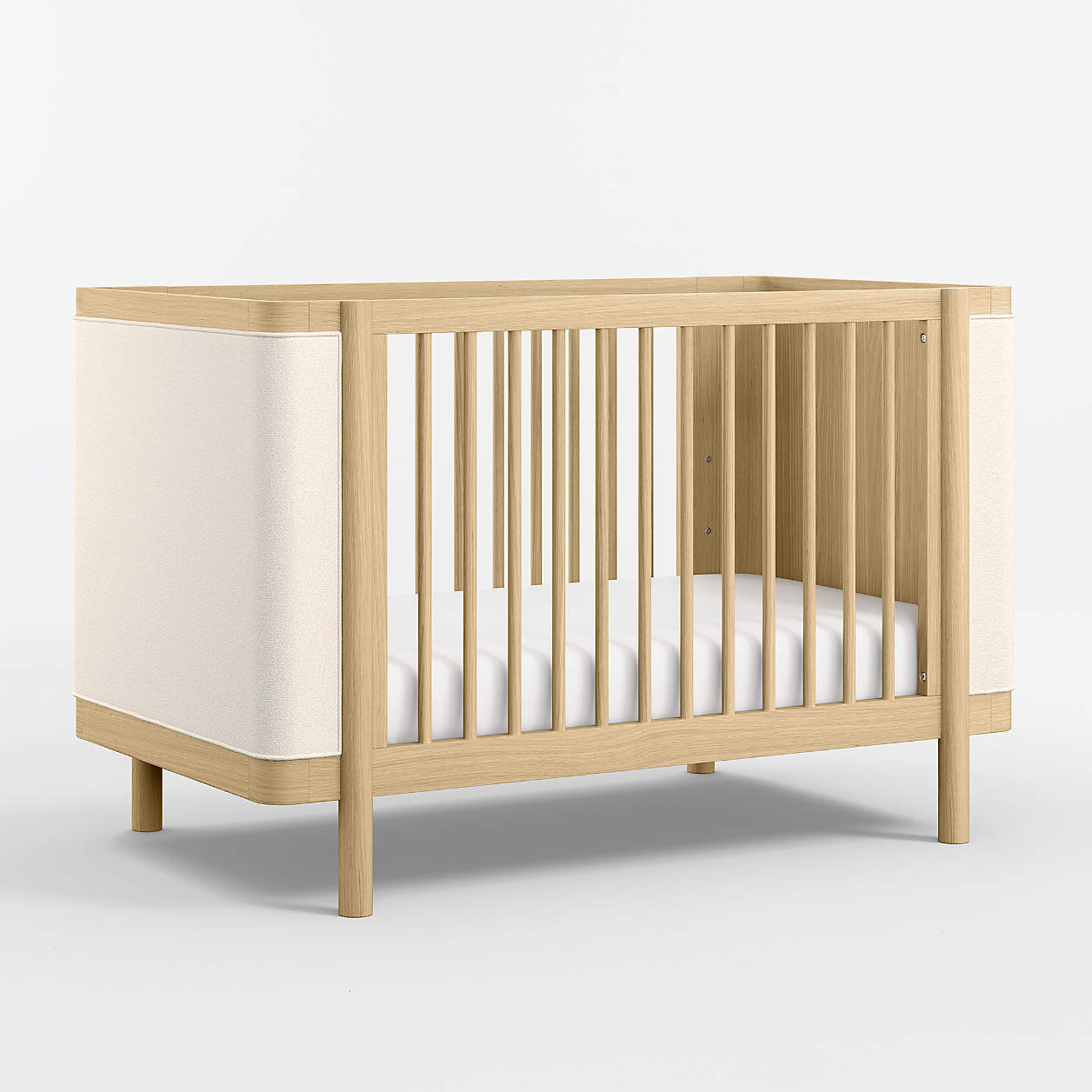 Redondo Upholstered Wood Baby Crib with Toddler Bed Rail + Reviews | Crate & Kids | Crate & Barrel